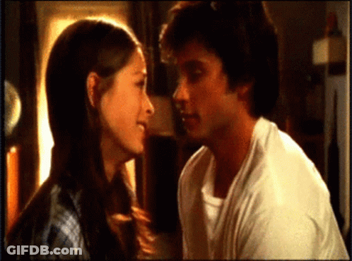 Man And Woman Looking At Each Other GIF