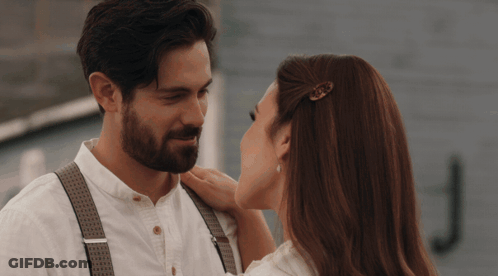 Man And Woman Looking At Each Other GIF