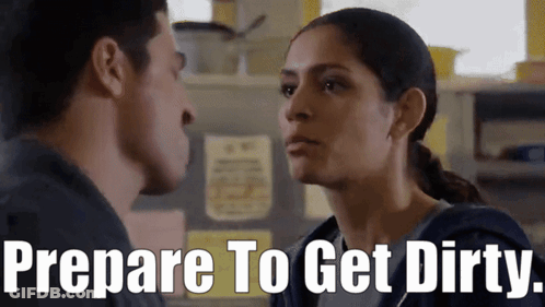 Man And Woman Looking At Each Other Prepare To Get Dirty GIF