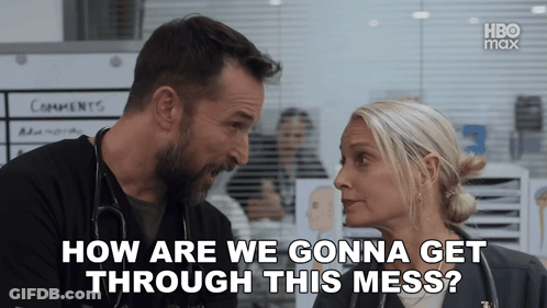 Man And Woman Looking At Each Other Saying How Are We Gonna Get Through This Mess GIF