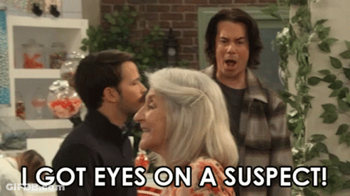 Man And Woman Looking At Each Other Saying I Got Eyes On A Suspect GIF