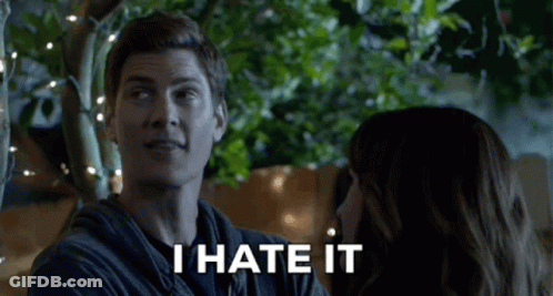 Man And Woman Looking At Each Other Saying I Hate It GIF