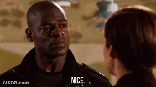 Man And Woman Looking At Each Other Saying Nice GIF