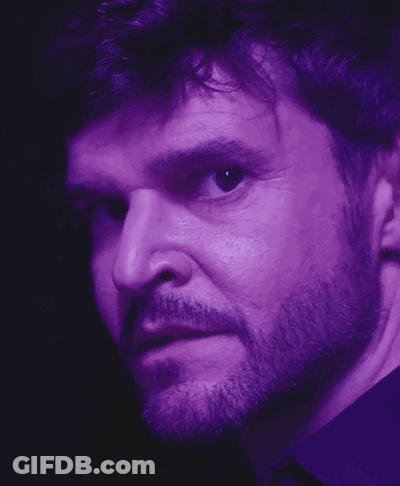 Man And Woman Looking At Each Other Saying What Did You Do GIF