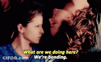 Man And Woman Looking At Each Other Says What Are We Doing Here We're Bonding GIF