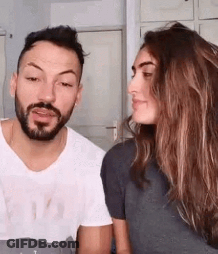 Man And Woman Looking At Each Other GIF