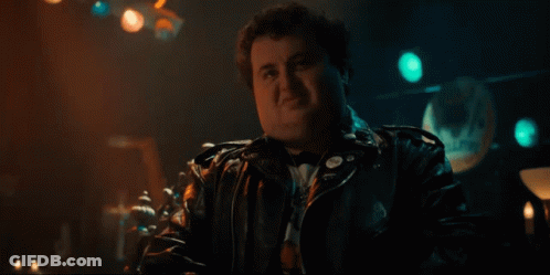 Man And Woman Looking At Each Other Smiling GIF