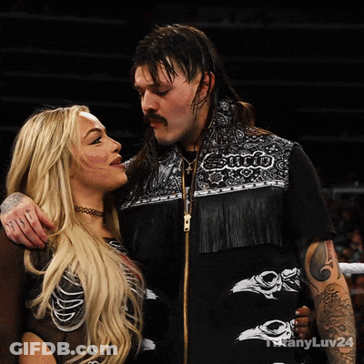 Man And Woman Looking At Each Other Sumo Vest GIF