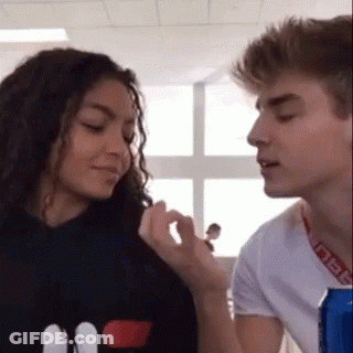 Man And Woman Looking At Each Other GIF