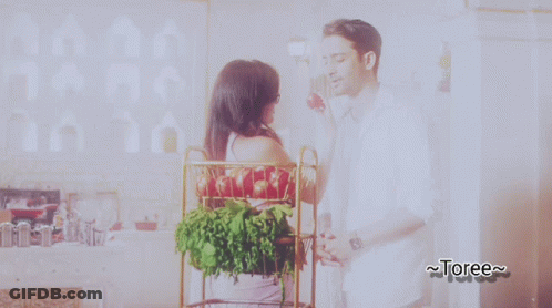 Man And Woman Looking At Each Other Toree GIF