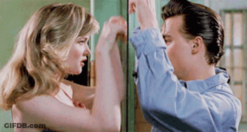 Man And Woman Looking At Each Other GIF