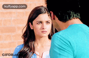 Man And Woman Looking At Each Other GIF