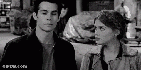 Man And Woman Looking At Each Other GIF