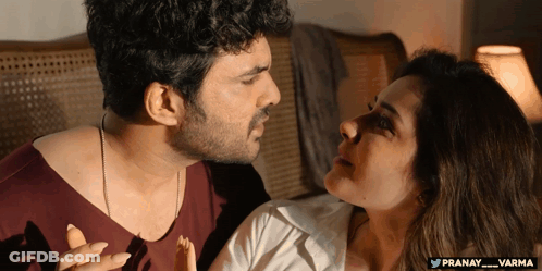 Man And Woman Looking At Each Other With Pranay And Varma GIF