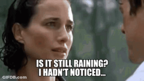 Man And Woman Looking At Each Other Woman Asking If Still Raining GIF