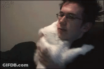Man And Woman Looking At Each Other Woman Hair Bun GIF