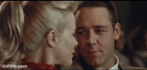 Man And Woman Looking At Each Other, Woman In Red Scarf GIF