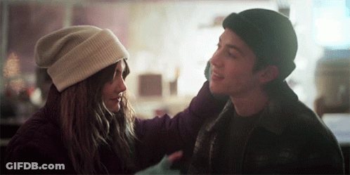 Man And Woman Looking At Each Other Woman Wearing Hat GIF
