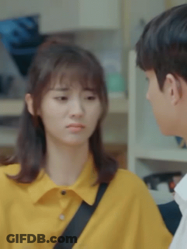 Man And Woman Looking At Each Other Woman Yellow Shirt GIF