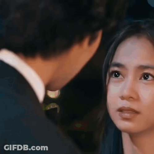 Man And Woman Looking At Each Other GIF