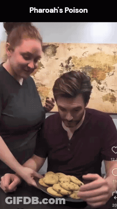 Man And Woman Looking At Pharaoh's Poison Cookies GIF