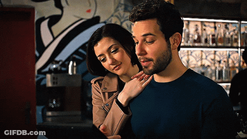 Man And Woman Looking At Tablet GIF