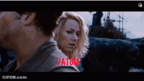 Man And Woman Looking At Vatom GIF