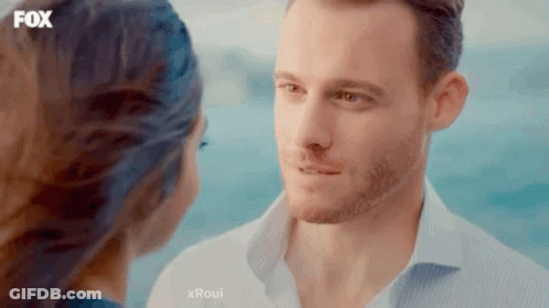 Man And Woman Looking Into Each Other's Eyes GIF