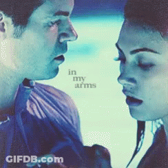 Man And Woman Looking Into Each Other's Eyes GIF