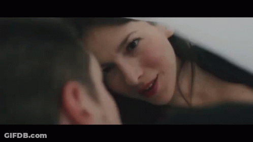 Man And Woman Looking Into Each Other's Eyes GIF