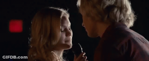 Man And Woman Looking Into Each Other's Eyes GIF