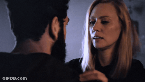 Man And Woman Looking Into Each Other's Eyes GIF