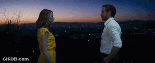 Man And Woman Looking Into Each Other's Eyes GIF