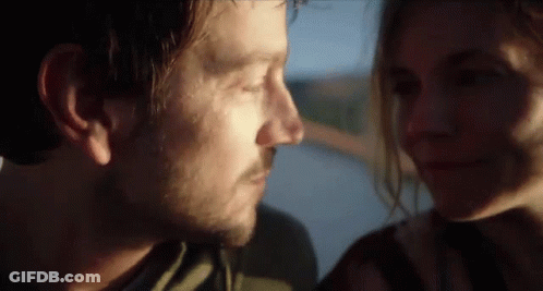 Man And Woman Looking Into Each Other's Eyes GIF