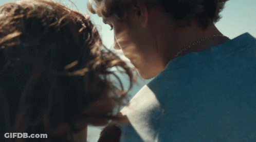 Man And Woman Looking Into Each Other's Eyes GIF