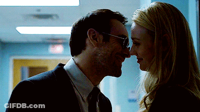 Man And Woman Looking Into Each Other's Eyes GIF