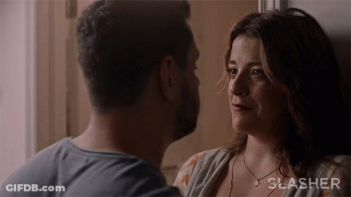 Man And Woman Looking Into Each Other's Eyes Slasher GIF