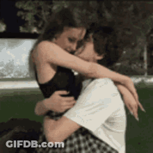 Man And Woman Looking Into Each Other's Eyes GIF