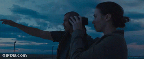 Man And Woman Looking Through Binoculars At Cloudy Sky GIF
