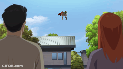 Man And Woman Looking Up At Superhero Over House GIF