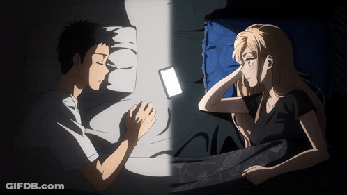 Man And Woman Lying In Bed GIF