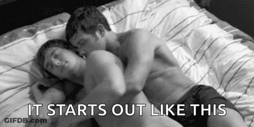 Man And Woman Lying In Bed GIF