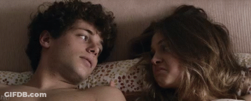 Man And Woman Lying On Bed Hitf GIF