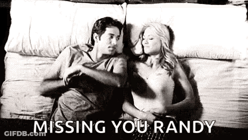 Man And Woman Lying On Bed GIF