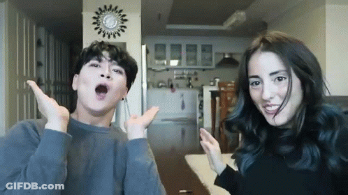 Man And Woman Making Funny Faces GIF