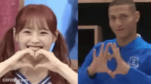 Man And Woman Making Heart GIF