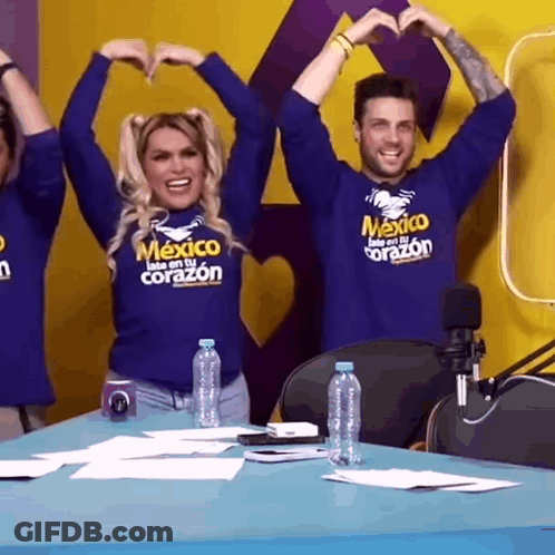 Man And Woman Making Heart Shape In Mexico Shirts GIF