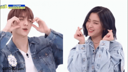 Man And Woman Making Heart With Hands GIF