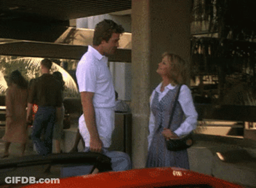 Man And Woman Next To Red Car GIF