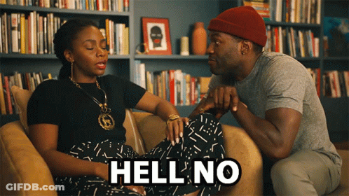 Man And Woman On Couch Saying Hell No GIF